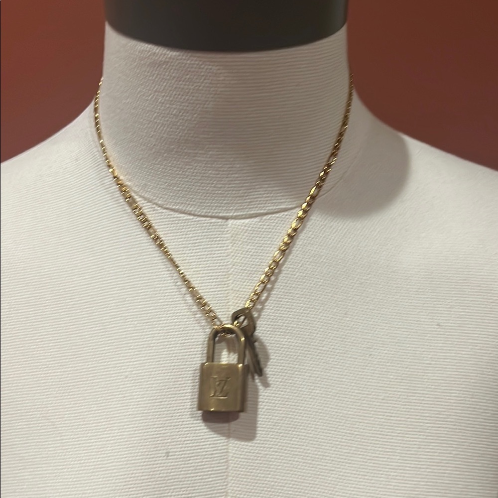 Louis Vuitton Gold Chain with Padlock Charm